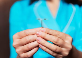 Hormonal coil dosage and melancholy threat