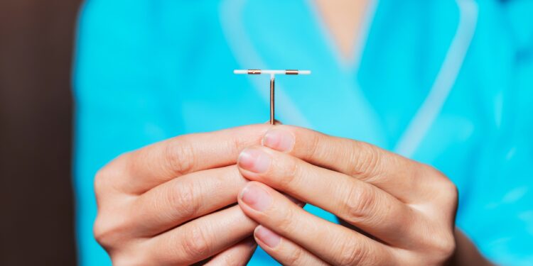 Hormonal coil dosage and melancholy threat