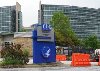1st CDC vaccine committee assembly beneath RFK Jr. : Photographs
