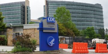 1st CDC vaccine committee assembly beneath RFK Jr. : Photographs