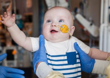 A bespoke gene-editing therapy for a child born with a life-threatening dysfunction : Photographs