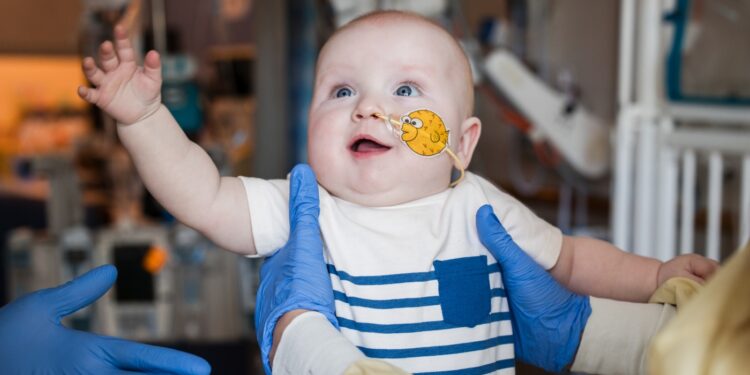 A bespoke gene-editing therapy for a child born with a life-threatening dysfunction : Photographs