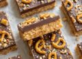 Excessive-Protein Caramel Peanut Butter Pretzel Bars • Wholesome Helper